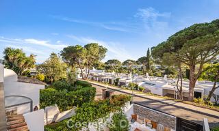 Masterfully renovated townhouse for sale in gated complex, frontline Aloha Golf, walking distance to the clubhouse in Nueva Andalucia, Marbella 56602 