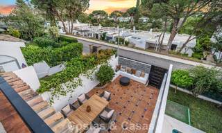 Masterfully renovated townhouse for sale in gated complex, frontline Aloha Golf, walking distance to the clubhouse in Nueva Andalucia, Marbella 56605 