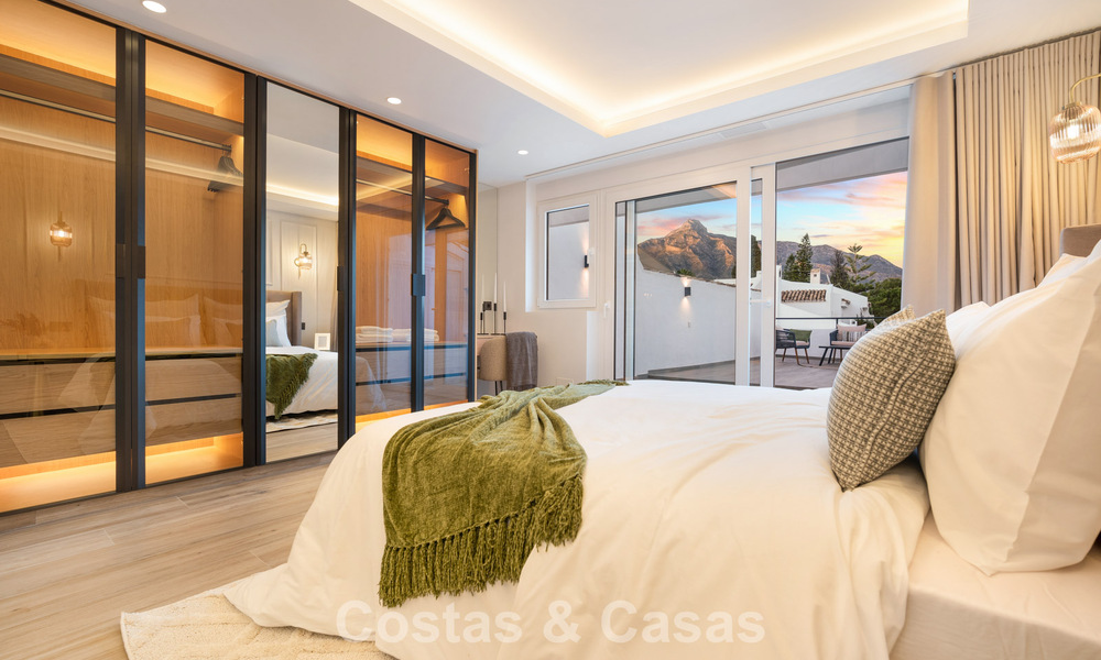 Masterfully renovated townhouse for sale in gated complex, frontline Aloha Golf, walking distance to the clubhouse in Nueva Andalucia, Marbella 56608