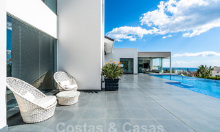 Contemporary luxury villa for sale with sea views in five-star golf resort in Marbella - Benahavis 56764 