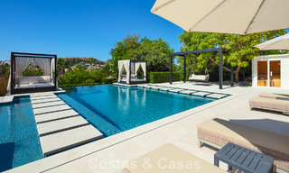 Modern, symmetrical, luxury villa for sale a stone's throw from the golf courses of Nueva Andalucia's valley, Marbella 56169 