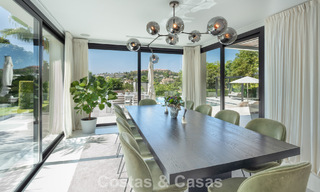 Modern, symmetrical, luxury villa for sale a stone's throw from the golf courses of Nueva Andalucia's valley, Marbella 56174 