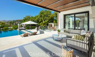 Modern, symmetrical, luxury villa for sale a stone's throw from the golf courses of Nueva Andalucia's valley, Marbella 56176 