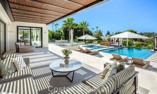 Modern, symmetrical, luxury villa for sale a stone's throw from the golf courses of Nueva Andalucia's valley, Marbella 56183 