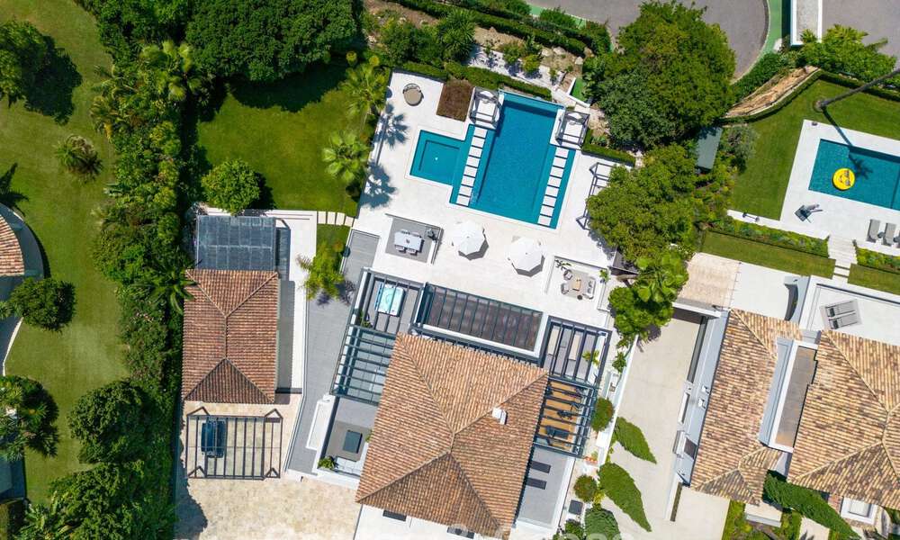 Modern, symmetrical, luxury villa for sale a stone's throw from the golf courses of Nueva Andalucia's valley, Marbella 56187