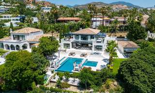 Modern, symmetrical, luxury villa for sale a stone's throw from the golf courses of Nueva Andalucia's valley, Marbella 56192 
