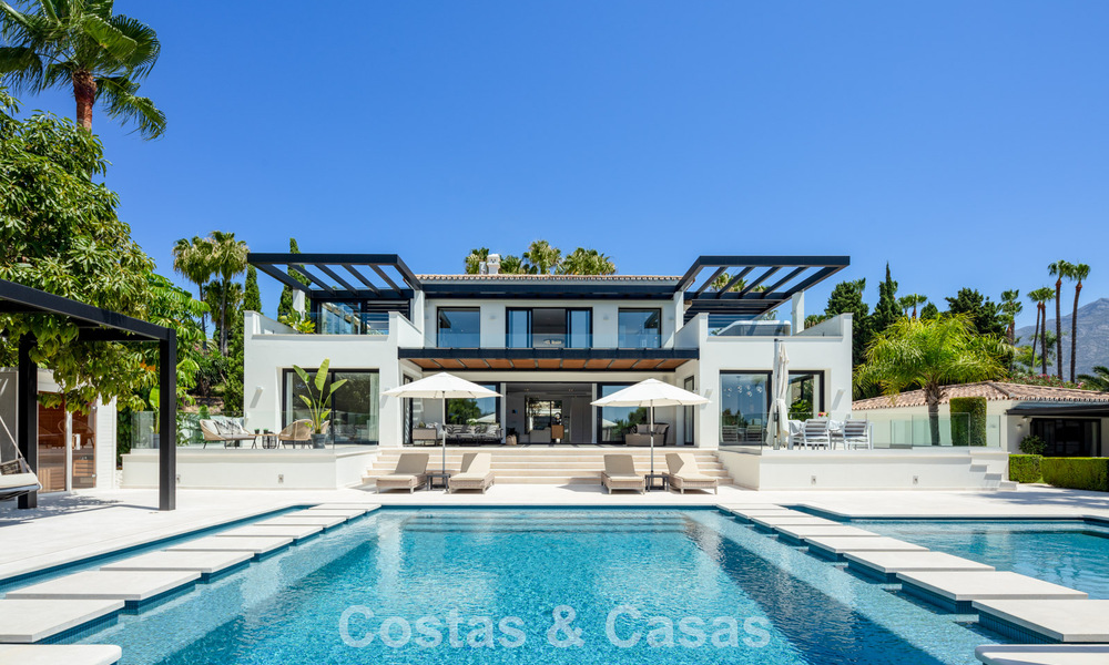 Modern, symmetrical, luxury villa for sale a stone's throw from the golf courses of Nueva Andalucia's valley, Marbella 56196