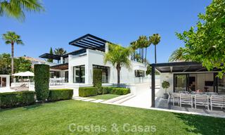 Modern, symmetrical, luxury villa for sale a stone's throw from the golf courses of Nueva Andalucia's valley, Marbella 56210 