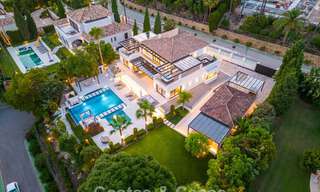 Modern, symmetrical, luxury villa for sale a stone's throw from the golf courses of Nueva Andalucia's valley, Marbella 56211 