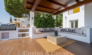 Move-in ready, luxury apartment for sale with inviting terrace and sea views in Marbella - Benahavis 57284 