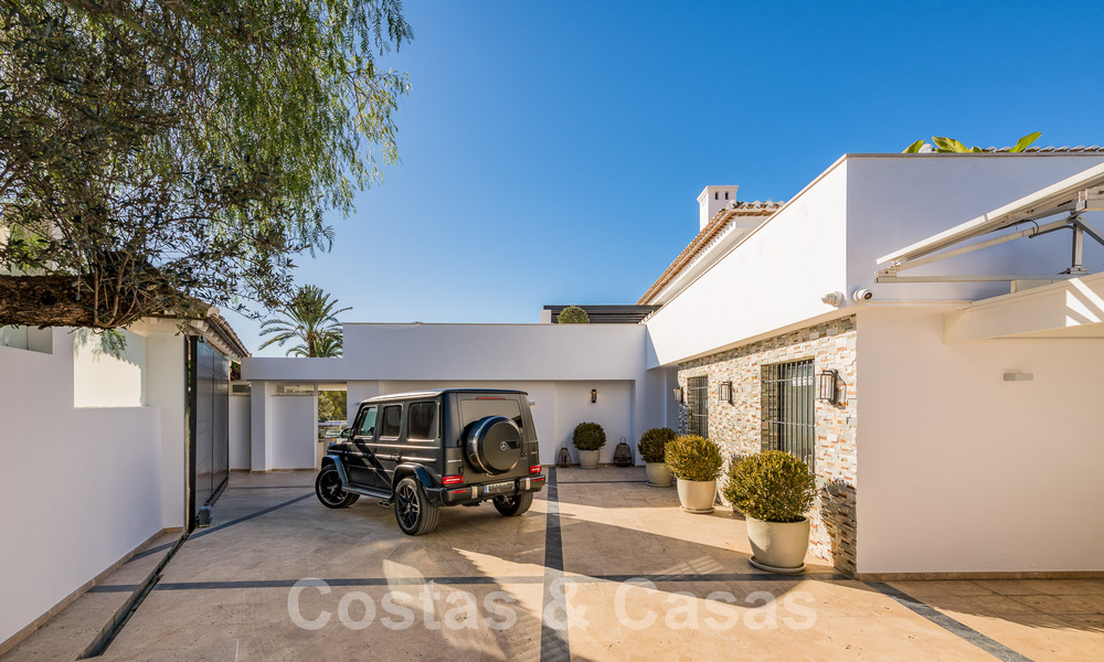 Modern renovated Mediterranean luxury villa for sale, located on the first line of golf, in the heart of Nueva Andalucia, Marbella 57002