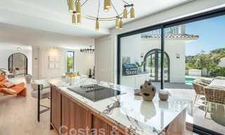 Characterful luxury villa in a unique architectural style for sale in the heart of the golf valley in Nueva Andalucia, Marbella 57664 