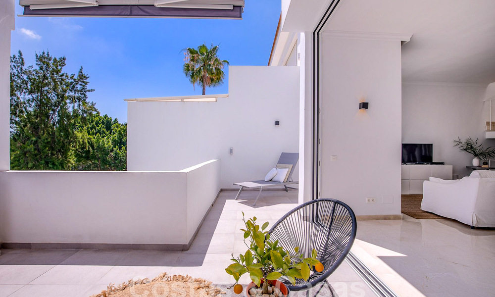 Spacious townhouse for sale with 360° views, adjacent to golf course in La Quinta golf resort, Marbella - Benahavis 57972