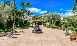 Luxury villa with traditional architecture for sale, located frontline golf in Nueva Andalucia, Marbella 58125 