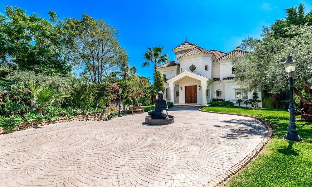 Luxury villa with traditional architecture for sale, located frontline golf in Nueva Andalucia, Marbella 58127