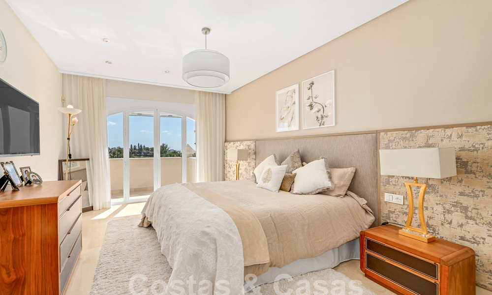 Luxury villa with traditional architecture for sale, located frontline golf in Nueva Andalucia, Marbella 58128