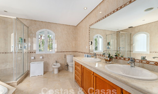Luxury villa with traditional architecture for sale, located frontline golf in Nueva Andalucia, Marbella 58129 