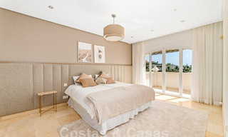 Luxury villa with traditional architecture for sale, located frontline golf in Nueva Andalucia, Marbella 58130 