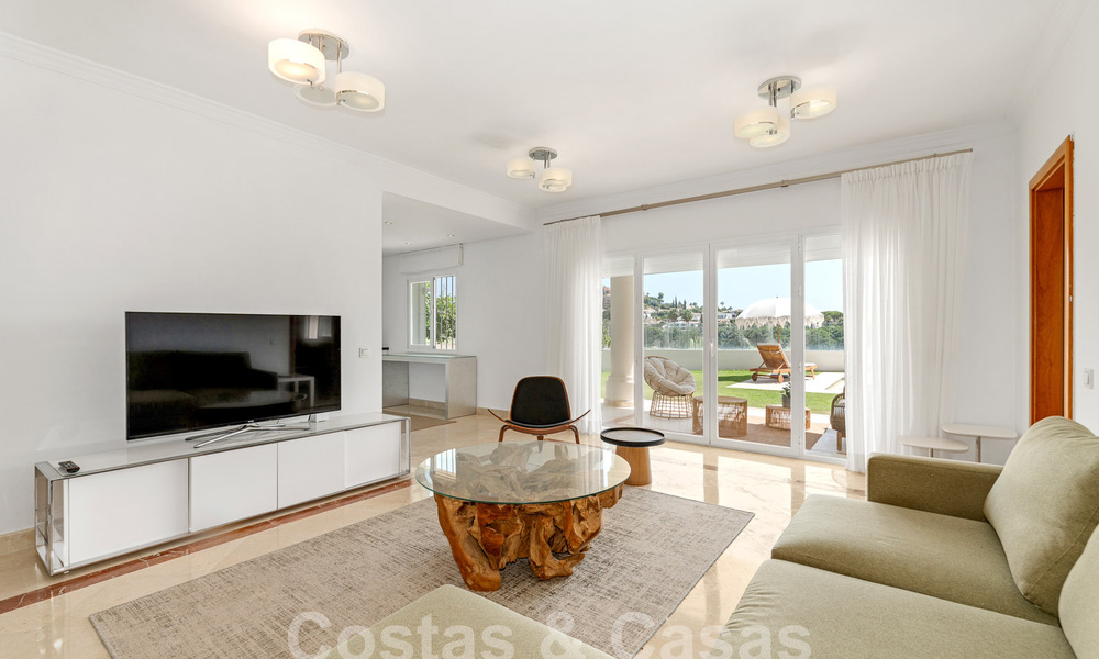 Luxury villa with traditional architecture for sale, located frontline golf in Nueva Andalucia, Marbella 58134