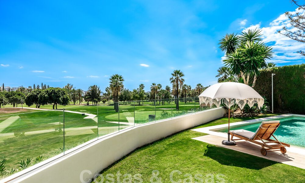 Luxury villa with traditional architecture for sale, located frontline golf in Nueva Andalucia, Marbella 58137