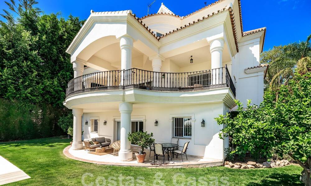 Luxury villa with traditional architecture for sale, located frontline golf in Nueva Andalucia, Marbella 58138