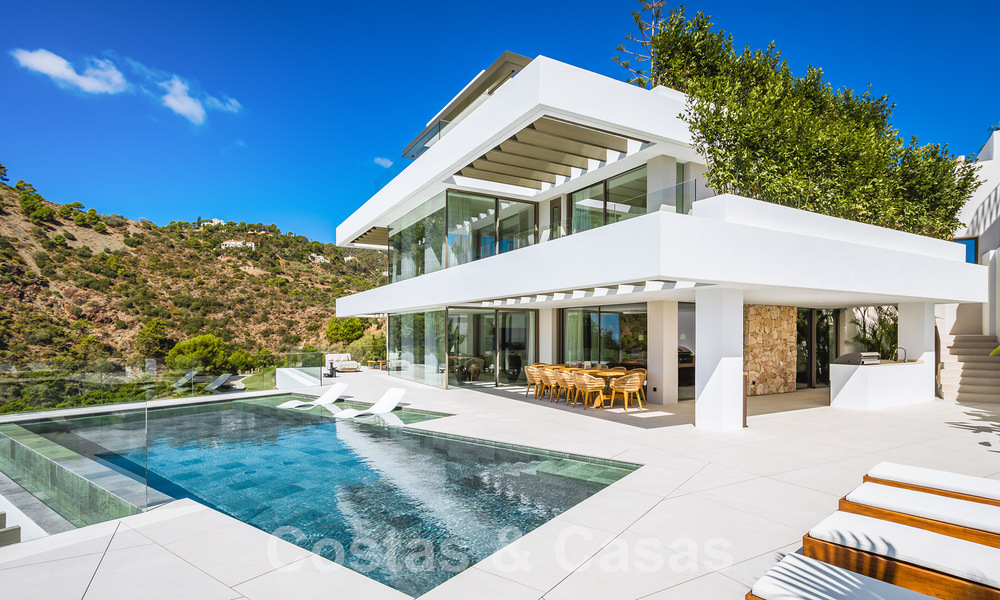 Luxury designer villa for sale in exclusive, gated frontline golf complex with panoramic views in La Quinta, Marbella - Benahavis 59070