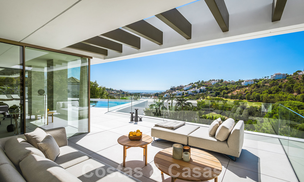 Luxury designer villa for sale in exclusive, gated frontline golf complex with panoramic views in La Quinta, Marbella - Benahavis 59071