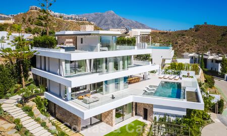 Luxury designer villa for sale in exclusive, gated frontline golf complex with panoramic views in La Quinta, Marbella - Benahavis 59074