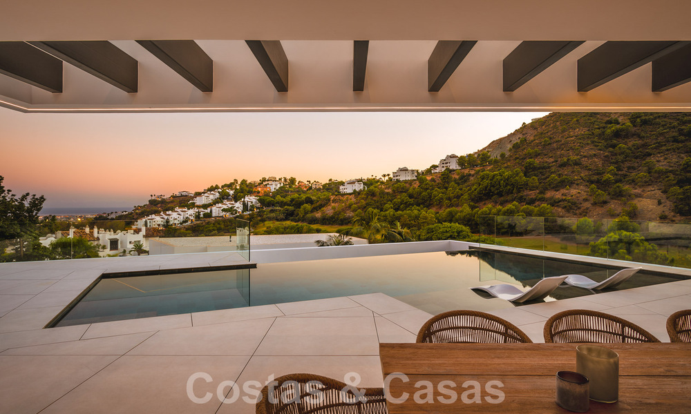 Luxury designer villa for sale in exclusive, gated frontline golf complex with panoramic views in La Quinta, Marbella - Benahavis 59076