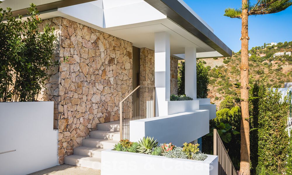 Luxury designer villa for sale in exclusive, gated frontline golf complex with panoramic views in La Quinta, Marbella - Benahavis 59078