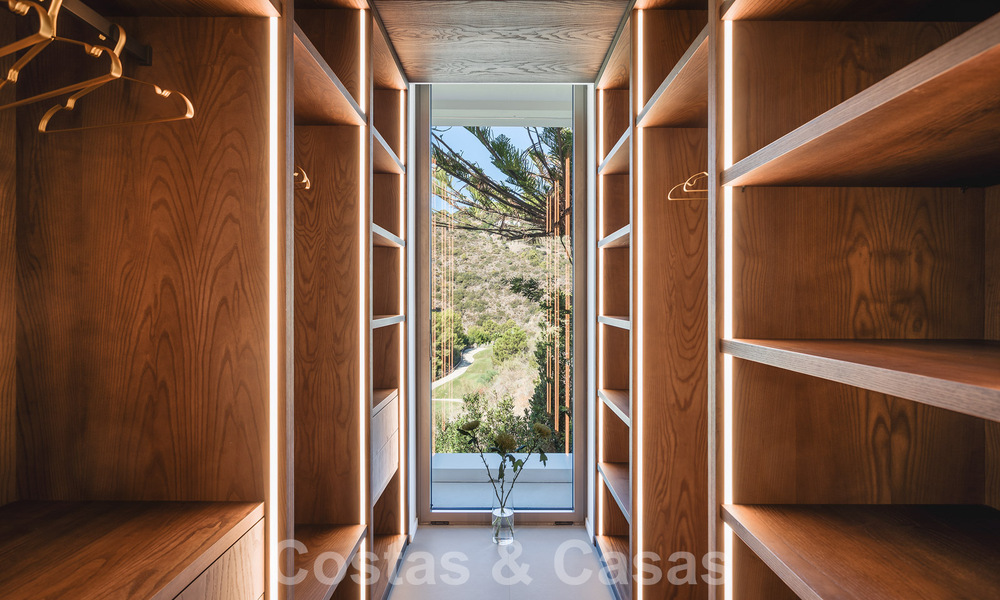 Luxury designer villa for sale in exclusive, gated frontline golf complex with panoramic views in La Quinta, Marbella - Benahavis 59080
