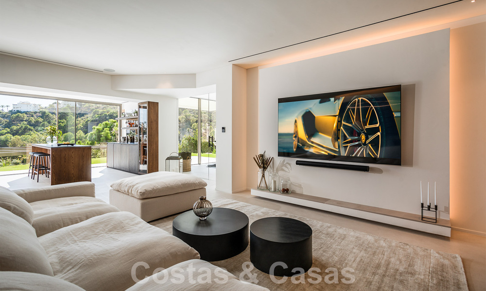 Luxury designer villa for sale in exclusive, gated frontline golf complex with panoramic views in La Quinta, Marbella - Benahavis 59092