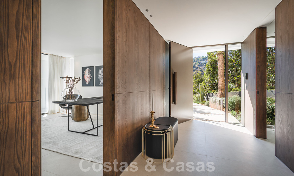 Luxury designer villa for sale in exclusive, gated frontline golf complex with panoramic views in La Quinta, Marbella - Benahavis 59095