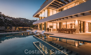 Luxury designer villa for sale in exclusive, gated frontline golf complex with panoramic views in La Quinta, Marbella - Benahavis 59100 