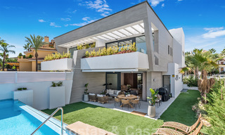 Modernist, semi-detached villa for sale a stone's throw from the beach near Puerto Banus in Marbella 58942 