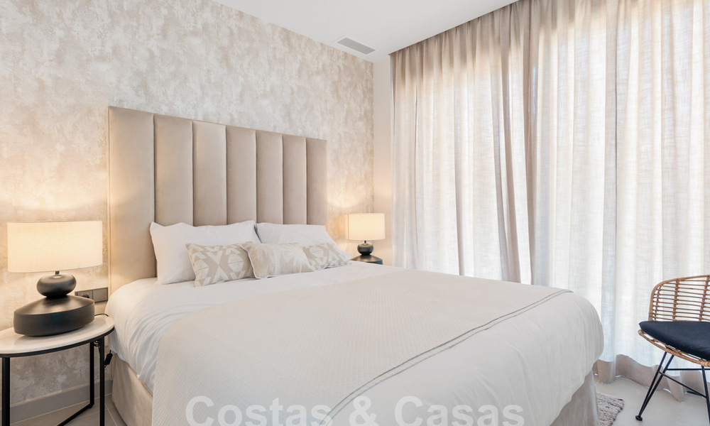Modernist, semi-detached villa for sale a stone's throw from the beach near Puerto Banus in Marbella 58951