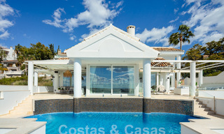 Mediterranean luxury villa with panoramic sea views for sale in Nueva Andalucia's golf valley in Marbella 59109 