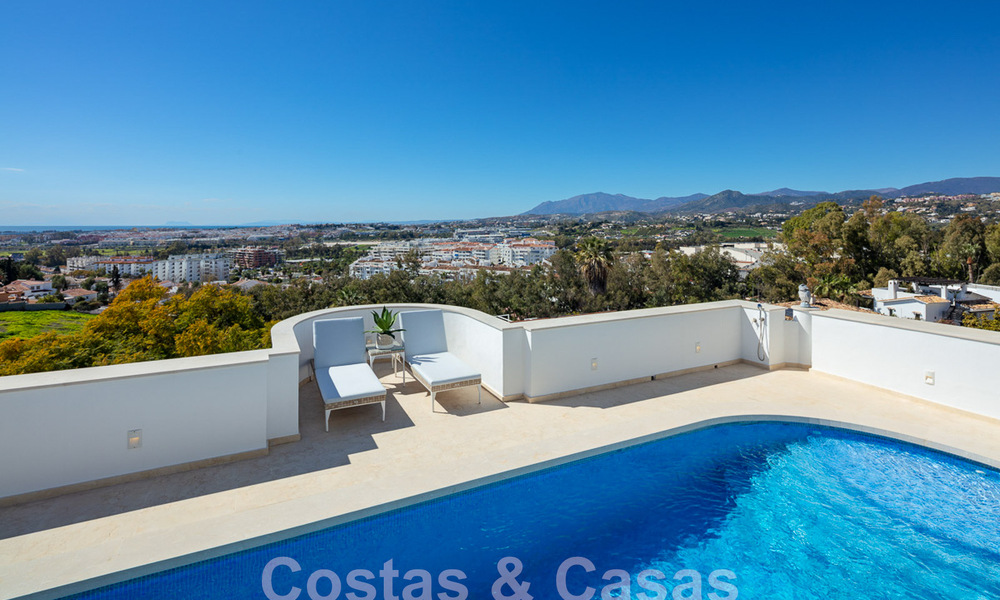 Mediterranean luxury villa with panoramic sea views for sale in Nueva Andalucia's golf valley in Marbella 59125