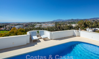 Mediterranean luxury villa with panoramic sea views for sale in Nueva Andalucia's golf valley in Marbella 59125 