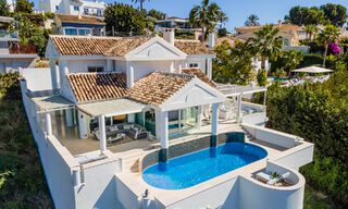 Mediterranean luxury villa with panoramic sea views for sale in Nueva Andalucia's golf valley in Marbella 59140 