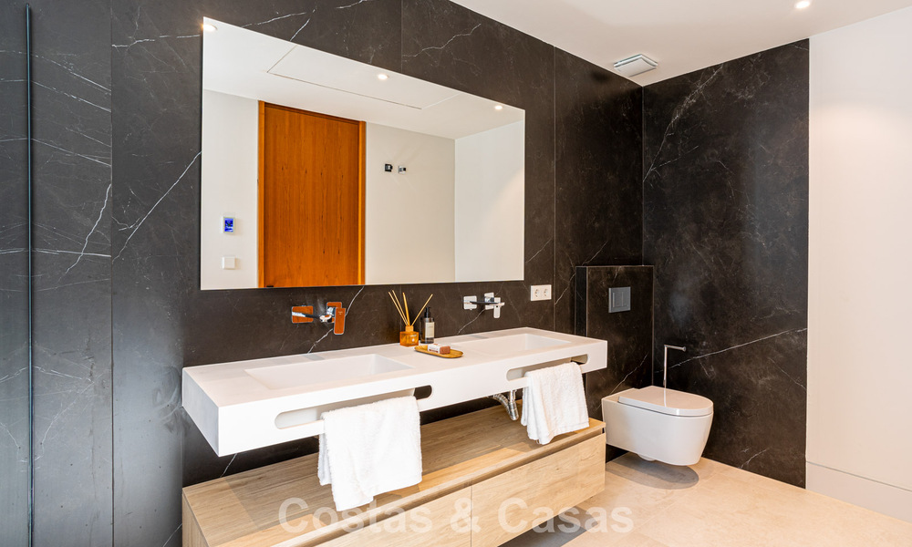 Contemporary new build villa for sale in a preferred golf urbanisation on the New Golden Mile, Marbella - Benahavis 782473
