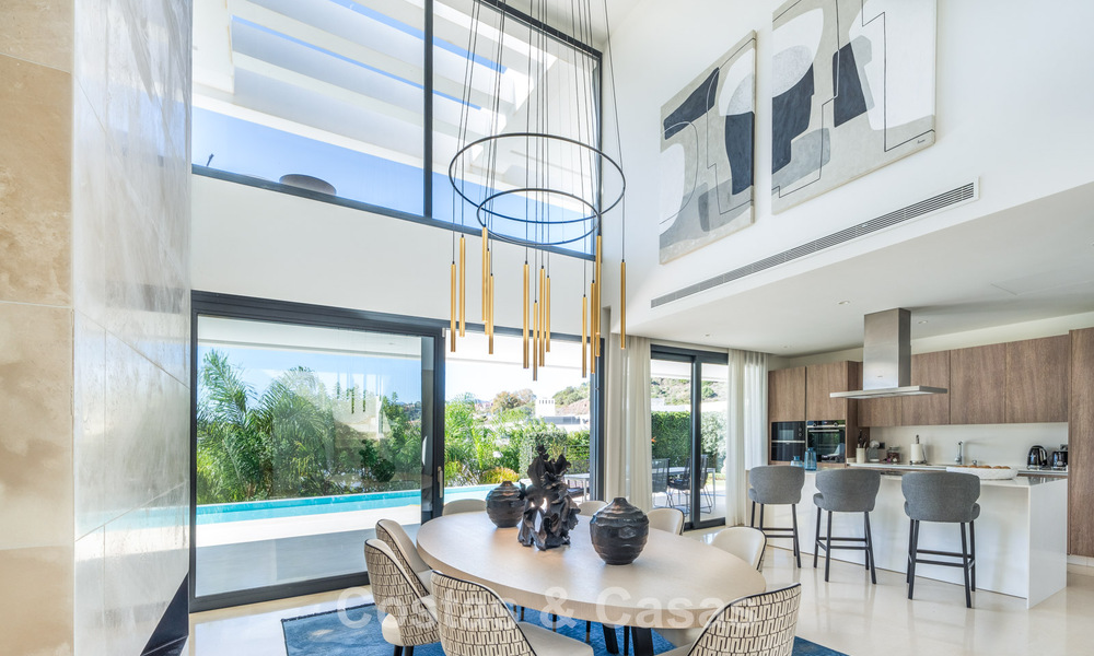 Sophisticated luxury villa with sleek design for sale in gated community in Nueva Andalucia's golf valley in Marbella 60370