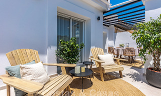 Contemporary renovated penthouse for sale with spacious terrace and sea views in La Quinta golf resort, Benahavis - Marbella 60613 