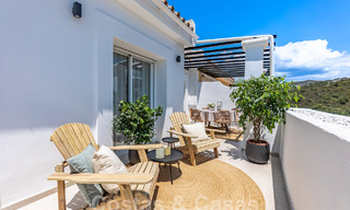 Contemporary renovated penthouse for sale with spacious terrace and sea views in La Quinta golf resort, Benahavis - Marbella 60614 