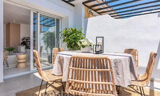 Contemporary renovated penthouse for sale with spacious terrace and sea views in La Quinta golf resort, Benahavis - Marbella 60617 