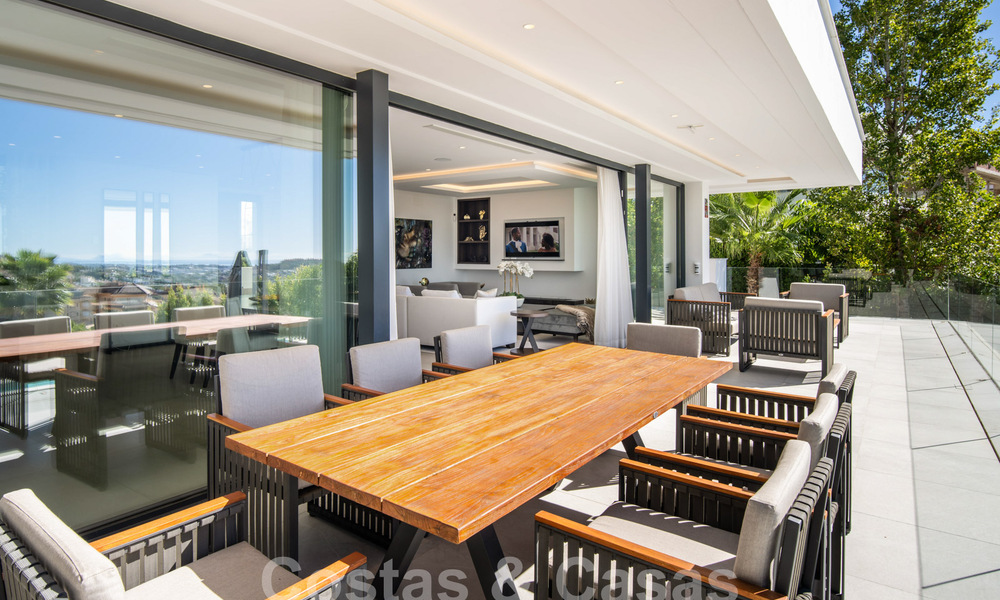 Sophisticated luxury villa with ultra-modern architecture for sale in Nueva Andalucia's golf valley, Marbella 60583