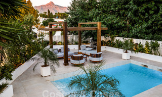 Modern renovated Mediterranean villa with fashionable interior design for sale within walking distance of Puerto Banus, Marbella 60740 