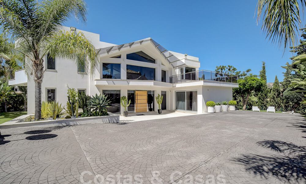 Modern luxury villa for sale looking at the golf in Nueva Andalucia, Marbella 60778