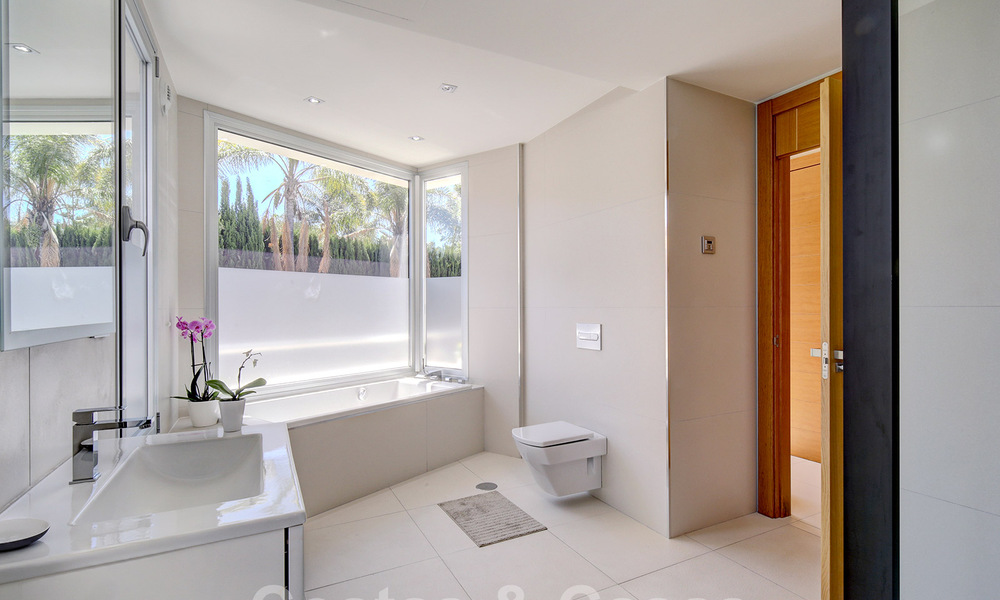 Modern luxury villa for sale looking at the golf in Nueva Andalucia, Marbella 60780