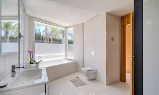 Modern luxury villa for sale looking at the golf in Nueva Andalucia, Marbella 60780 